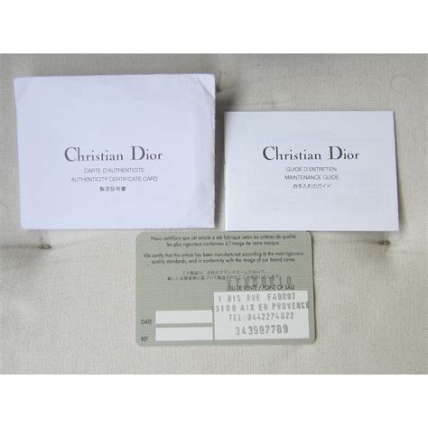 how to tell if a christian dior bag is real - Christian Dior authenticity card.